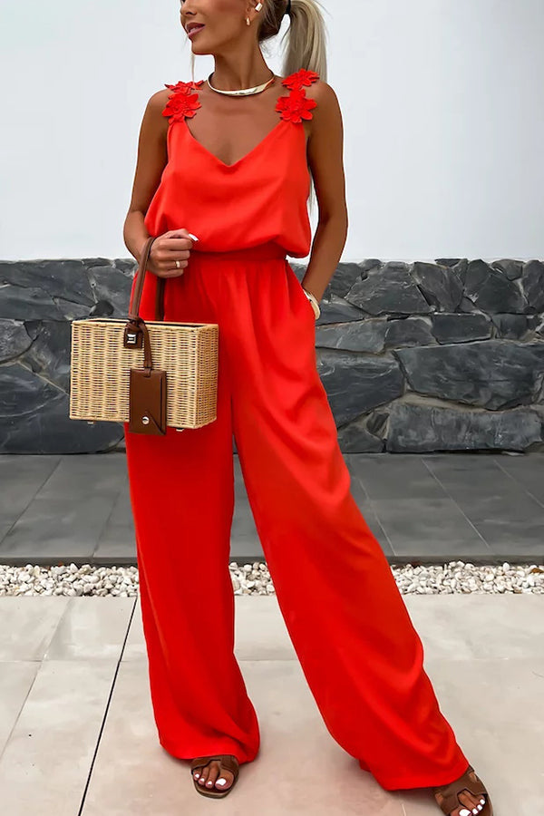Summer Jumpsuit loose with embroidered flowers and plain straps for an elegant and comfortable style