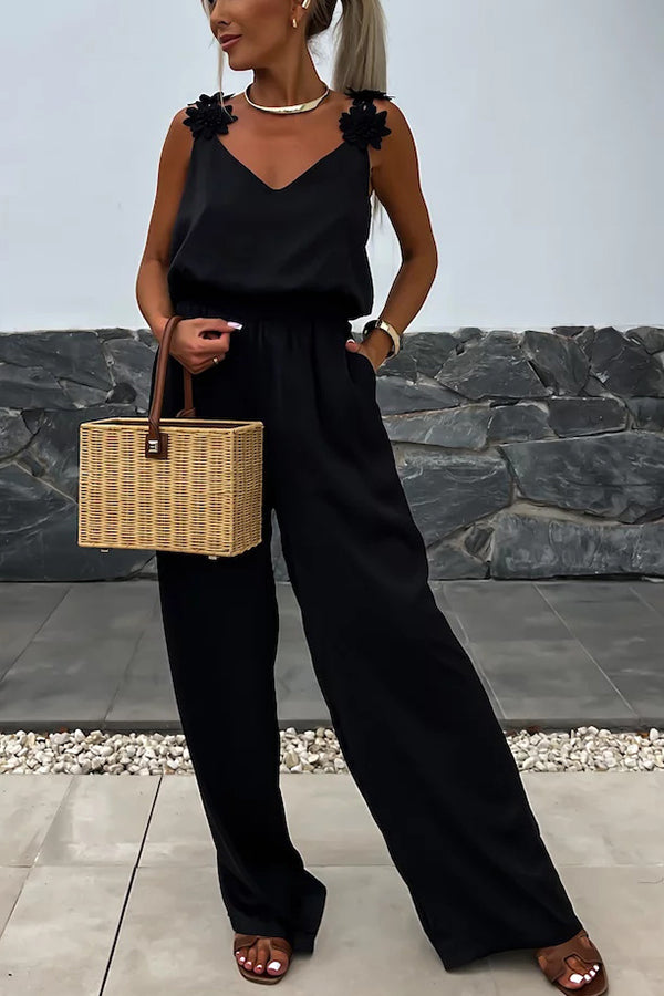 Summer Jumpsuit loose with embroidered flowers and plain straps for an elegant and comfortable style