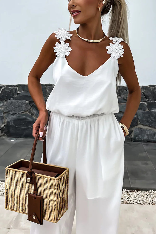 Summer Jumpsuit loose with embroidered flowers and plain straps for an elegant and comfortable style