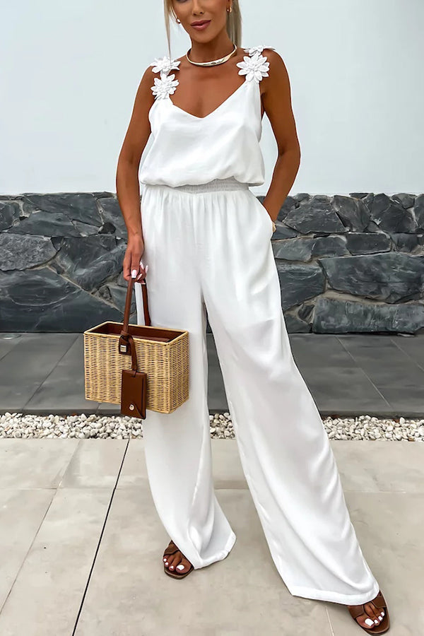 Summer Jumpsuit loose with embroidered flowers and plain straps for an elegant and comfortable style